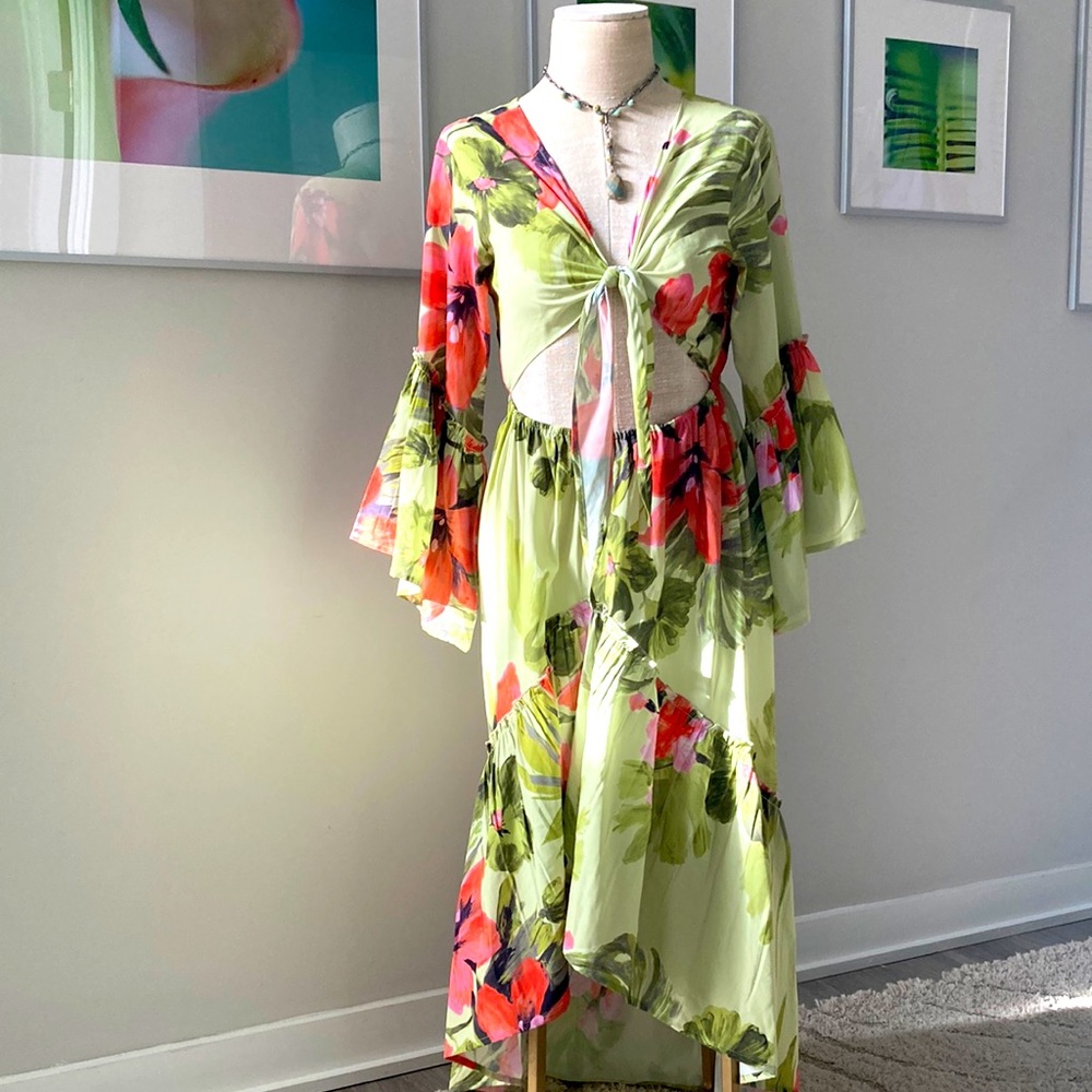 RAGA - new high low flower dress with tie in the front and a cut out.